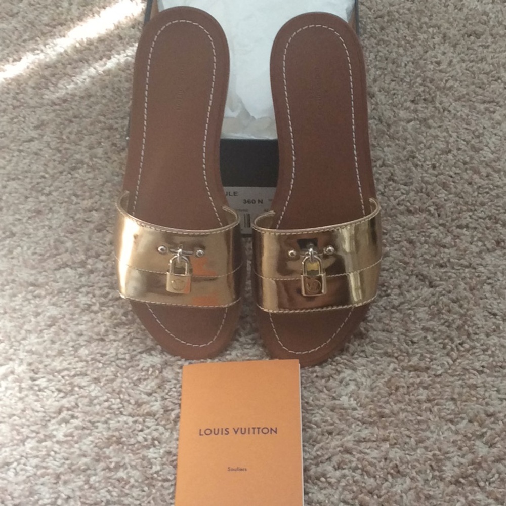 Louis Vuitton lock it gold sandles